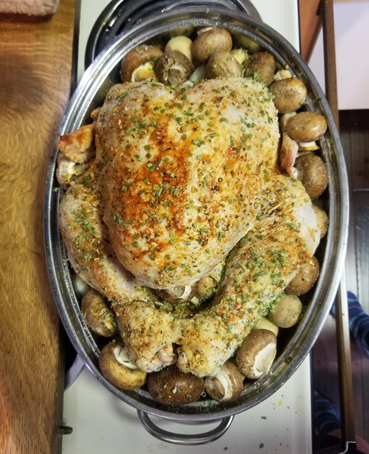 Reviewer photo of a turkey and vegetables inside the roaster