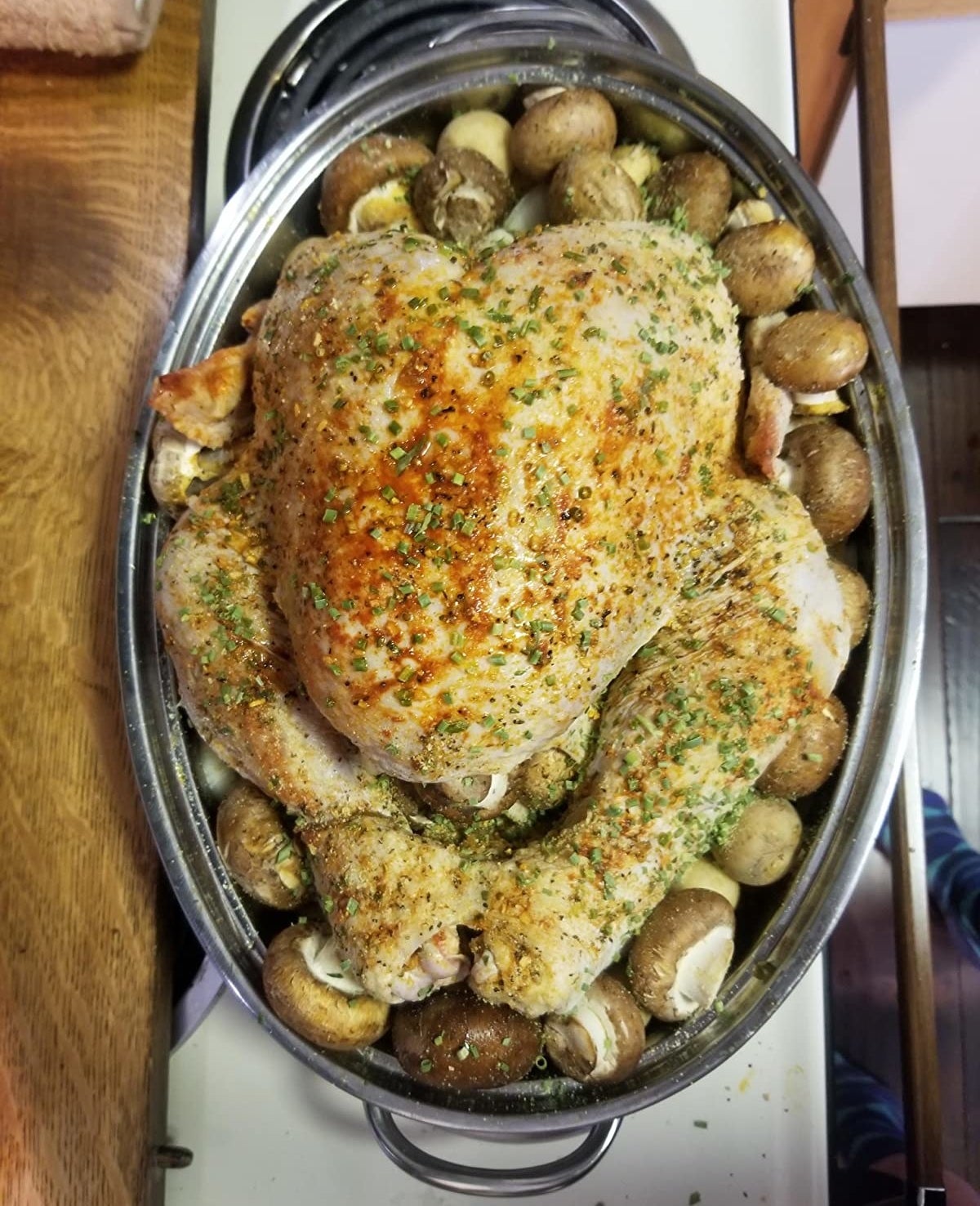 Reviewer photo of a turkey and vegetables inside the roaster