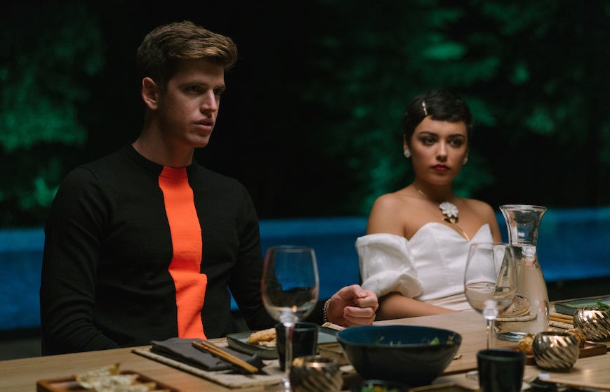 Guzmán and Ari sitting at a dining table