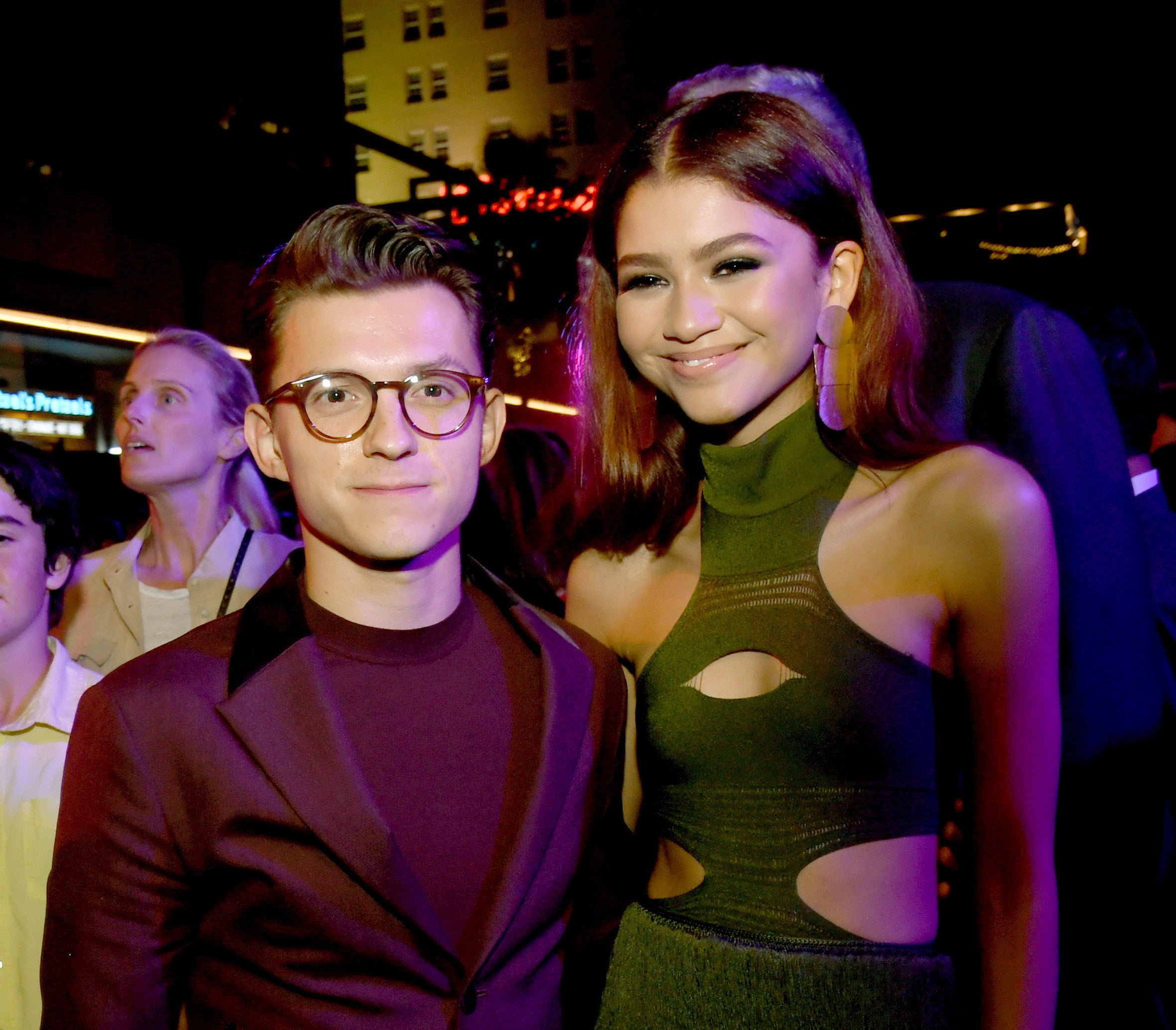 Photo of Tom Holland and Zendaya with their arms around each other&#x27;s waist