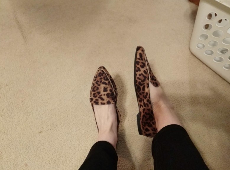 Reviewer wearing leopard print pointed loafers