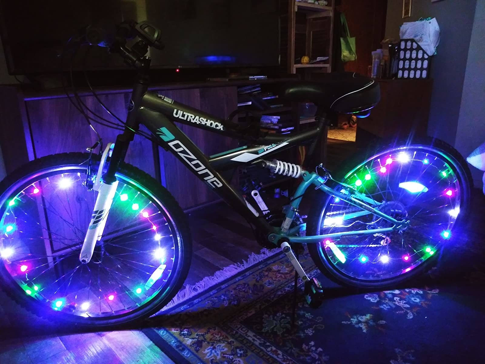 Bicycle with lights around the wheels