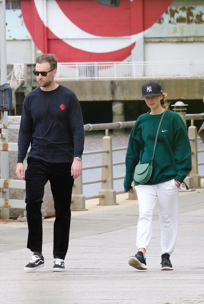 Jennifer Lawrence is seen out for a walk by the Hudson river with her husband Cooke Maroney
