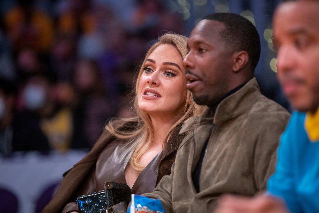 Adele and sports agent Rich Paul attend a game between the Golden State Warriors and the Los Angeles Lakers
