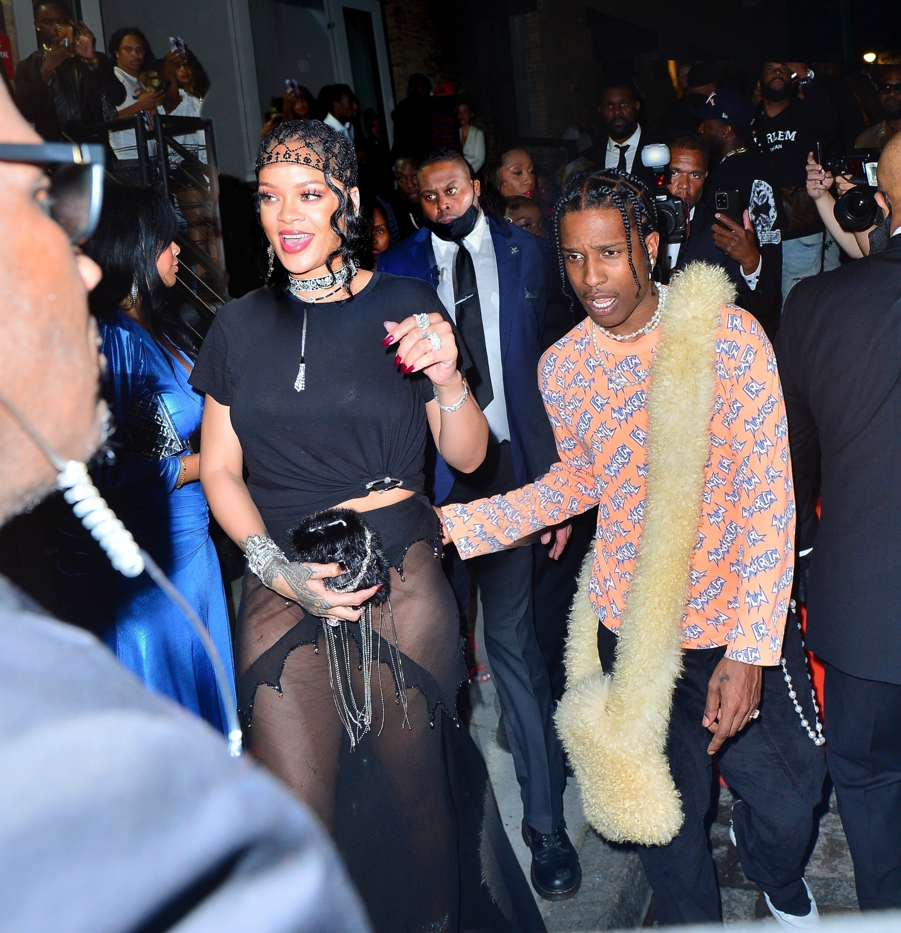 Rihanna and beau A$AP Rocky hold hands as they leave her Met Gala after-party at Davide in New York