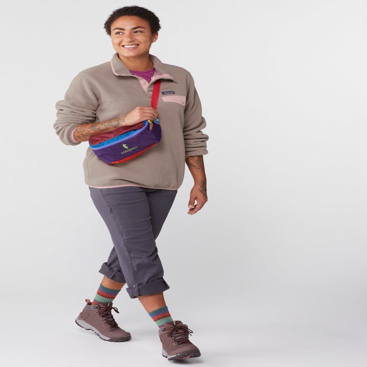 another model wearing the taupe and pink fleece