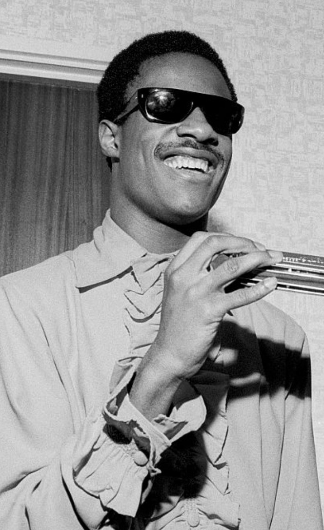 Wonder holding a harmonica in 1969