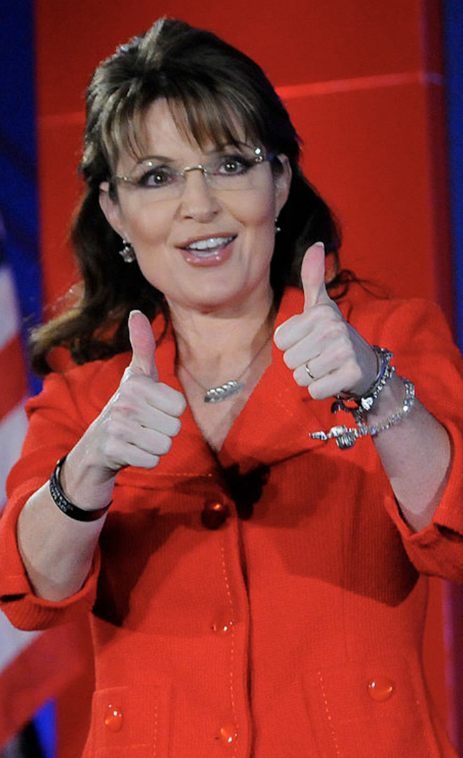 Palin giving a thumbs up at a conference in 2010