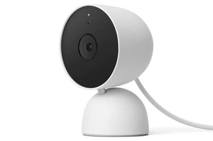 The white round wired security camera