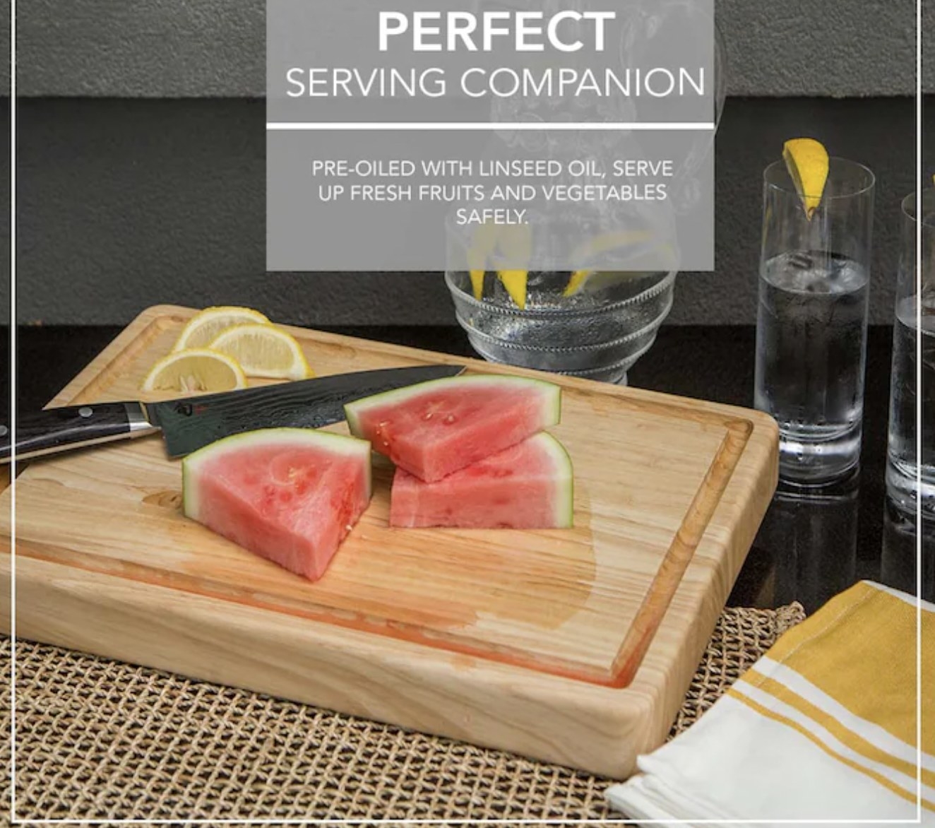 The board with watermelon and a knife, described as the &quot;perfect serving companion: pre-oiled with linseed oil, serve up fresh fruits and vegetables safely&quot;