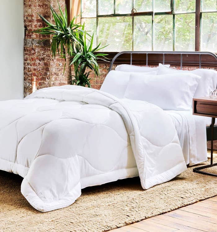 the white comforter on a bed