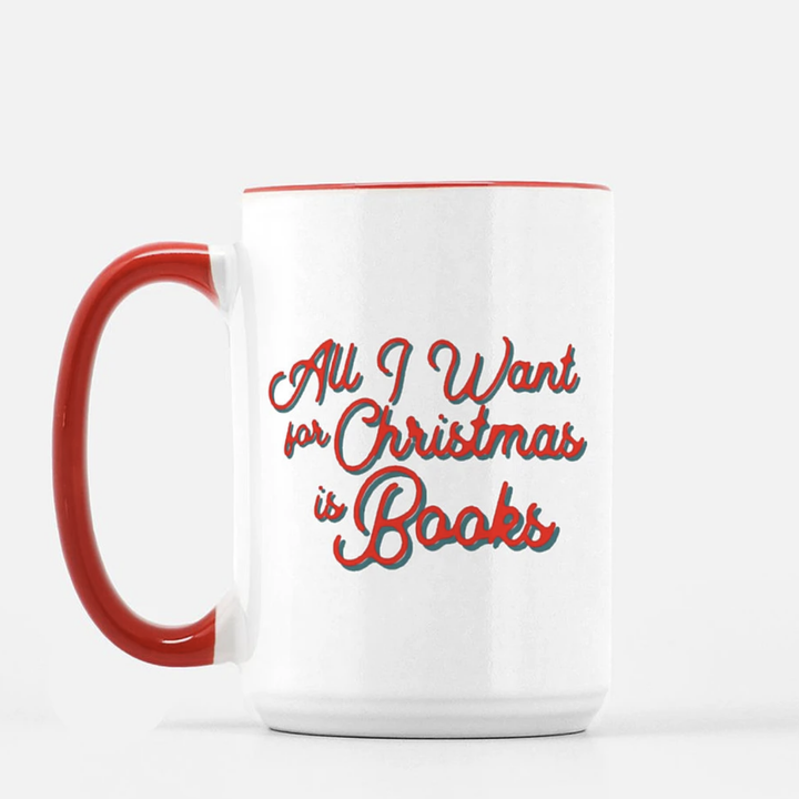 white mug, red lettering that reads all i want for christmas is books