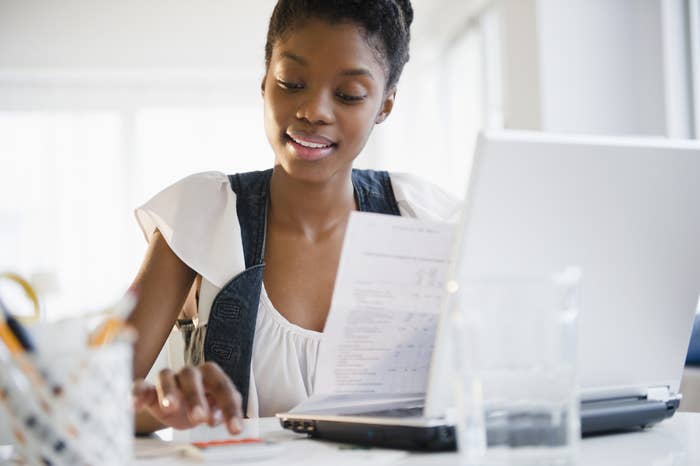 A woman setting a budget