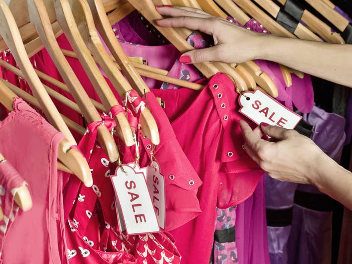 A woman shopping from the sales section