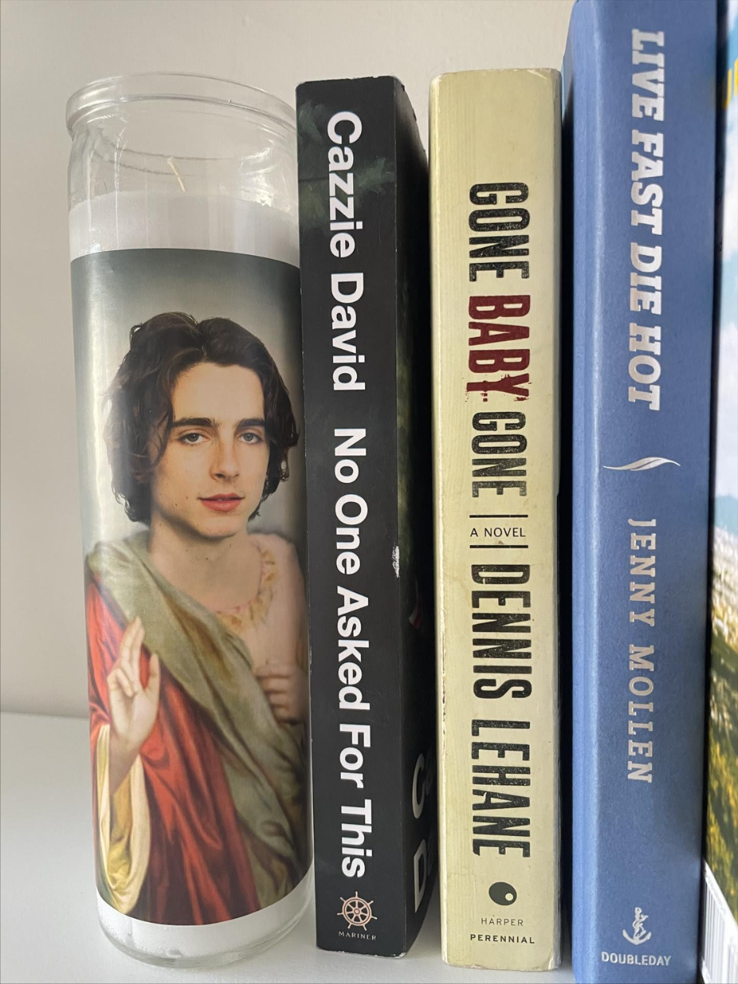 A candle with timothee chalamet as a saint