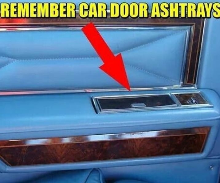 Blue &#x27;70s car door interior with metal ash tray