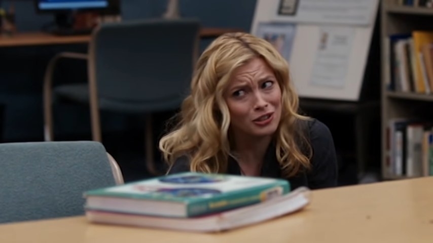 Britta sitting at the study table in &quot;Community&quot;