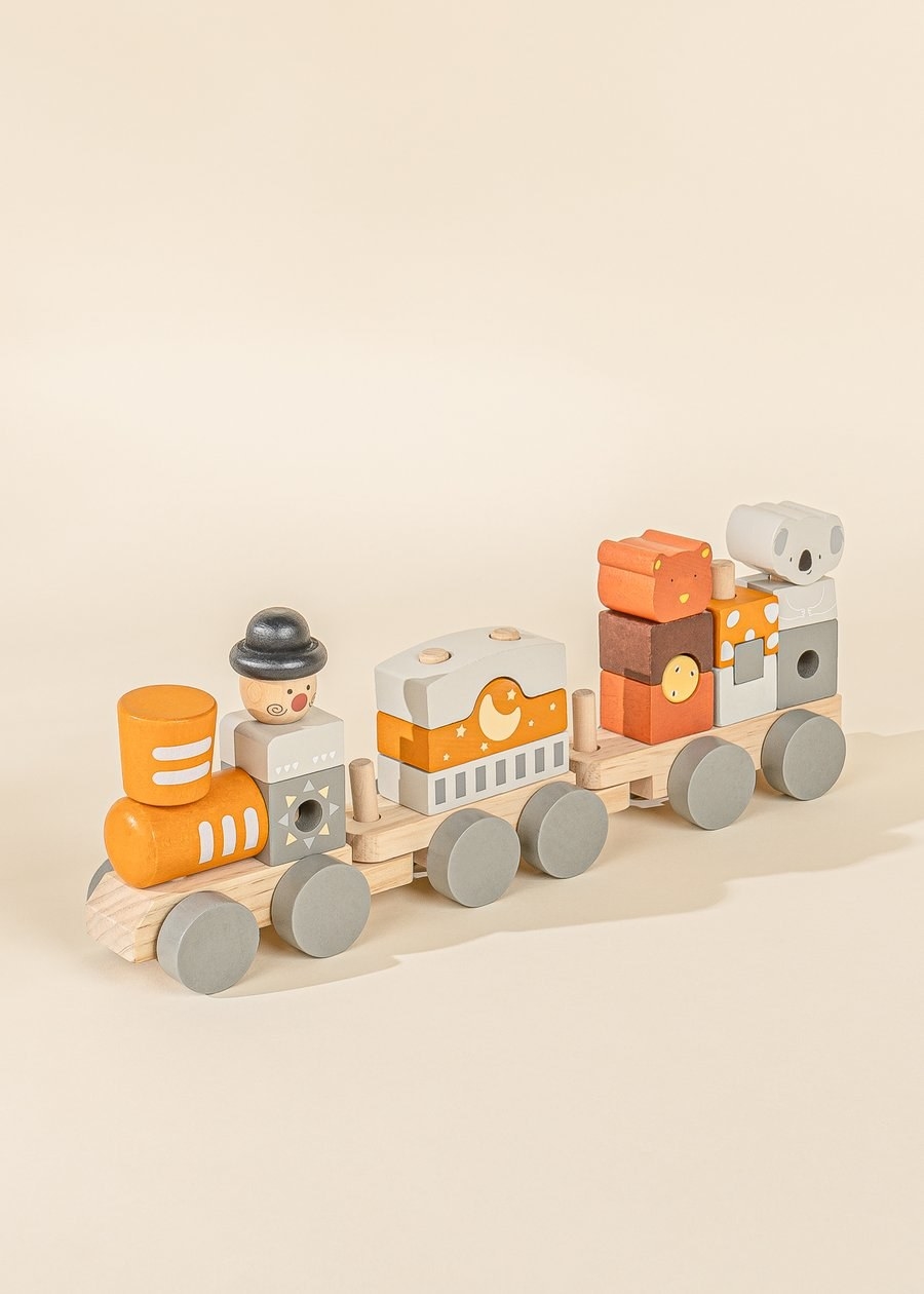 an orange and gray circus-themed train block set