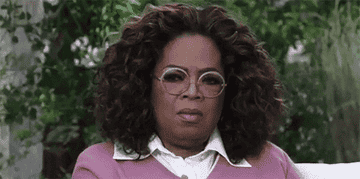Oprah shaking her head no