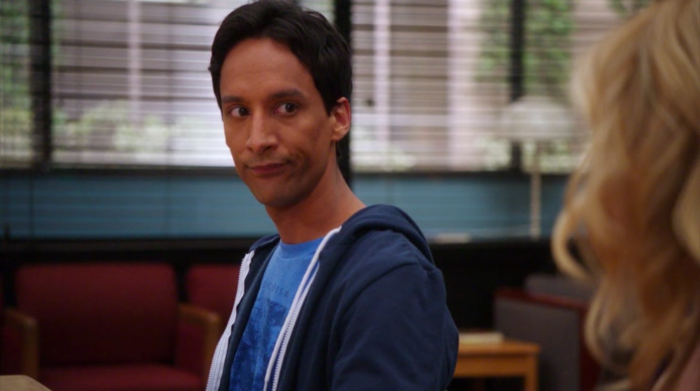 Abed talking to Britta at the study table in &quot;Community&quot;