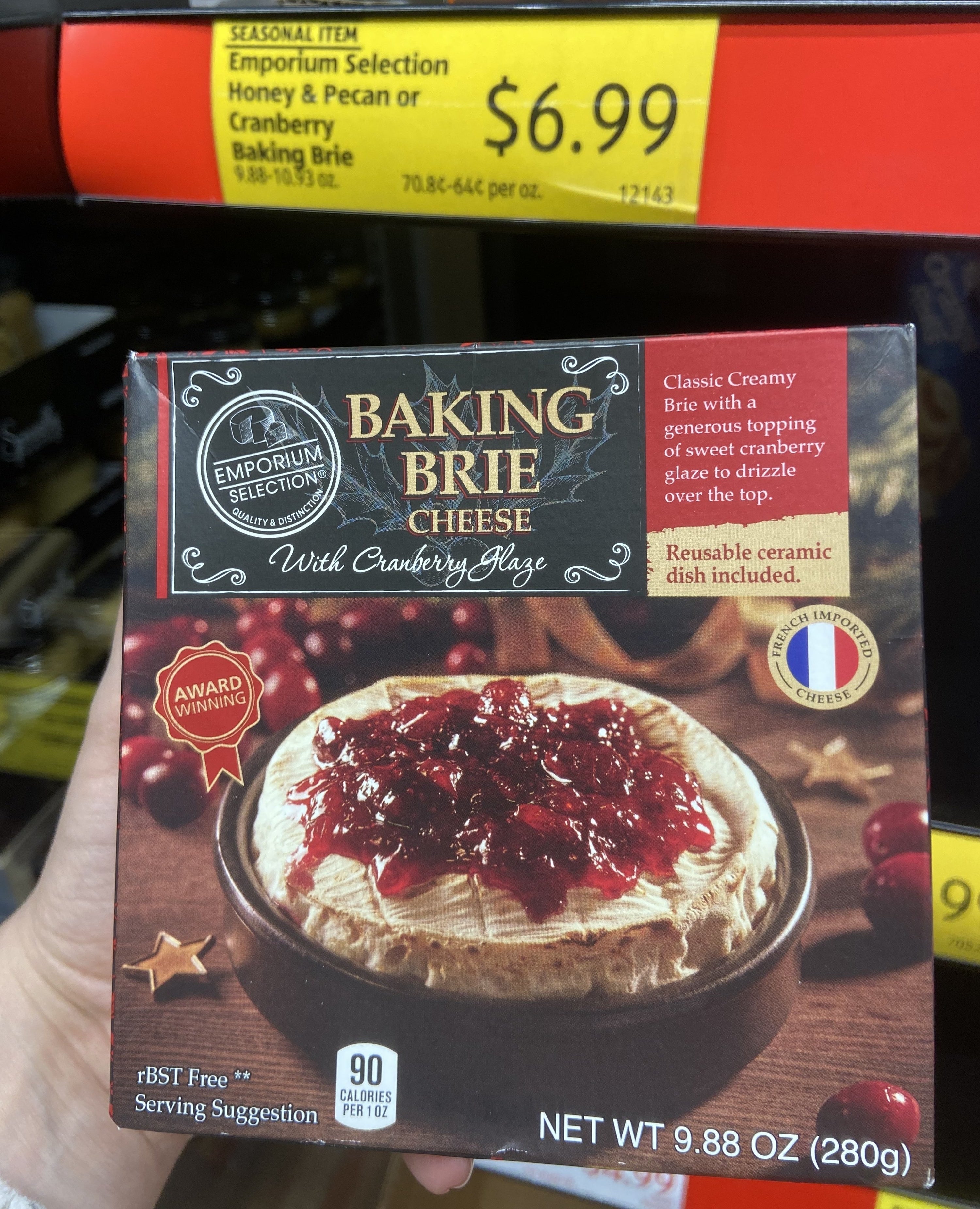 Box of baking brie cheese in dish