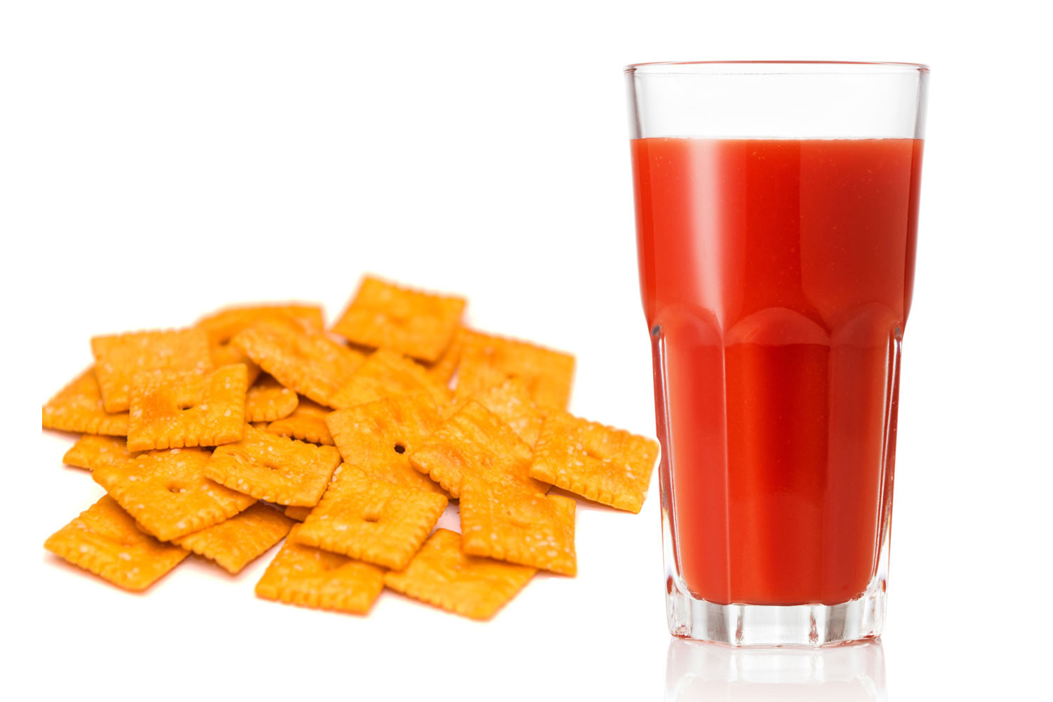 Cheez-It crackers and tomato juice in a glass.