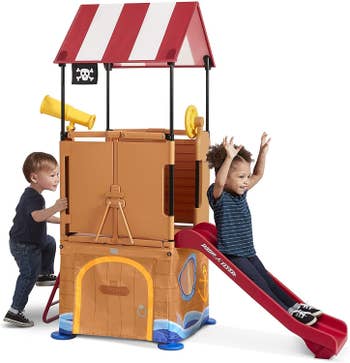 the pirate play set with a slide and telescope