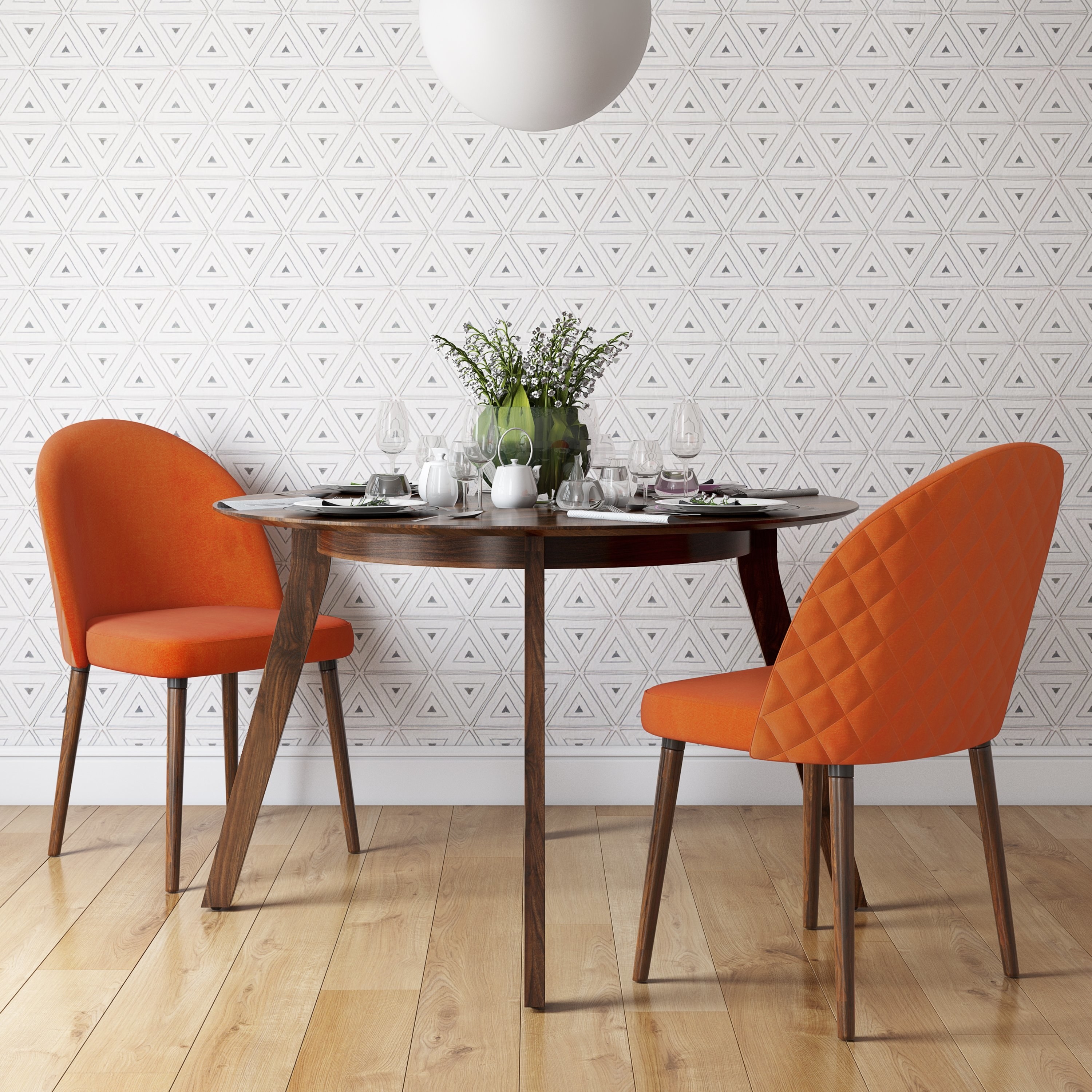 The dining chairs in the color Orange Velvet