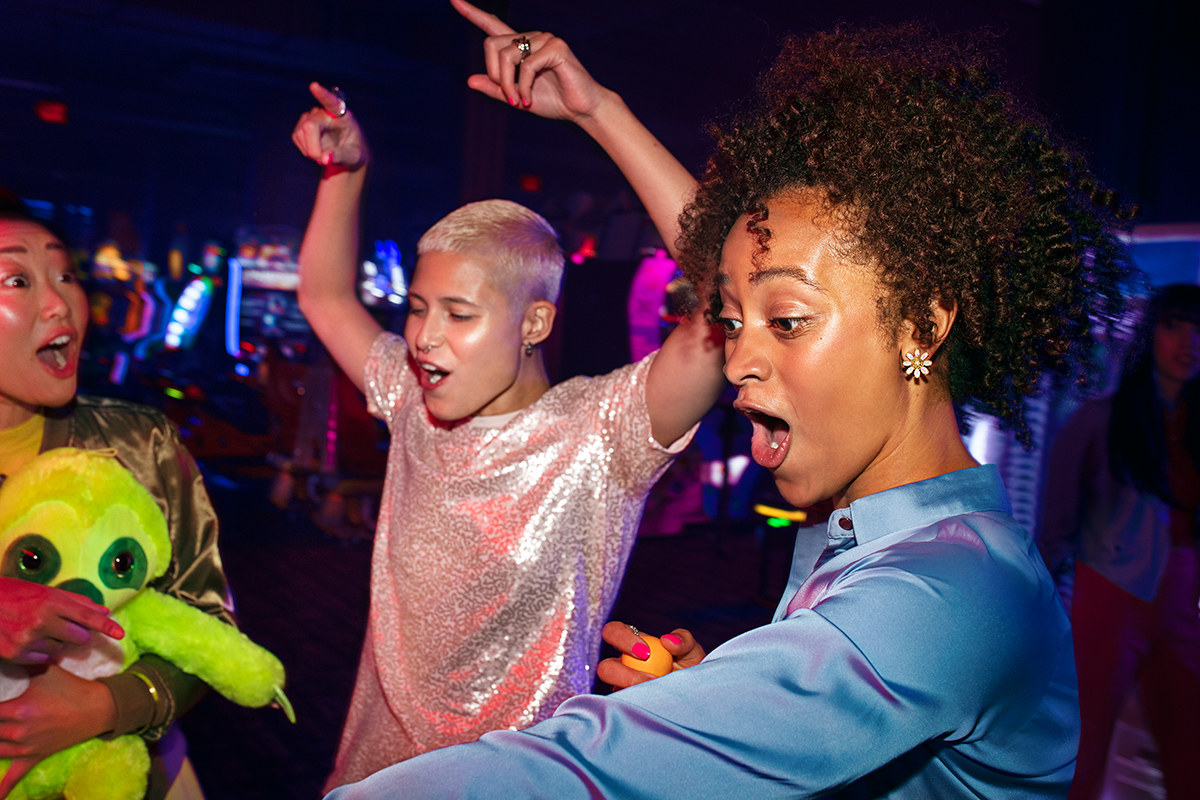 Women celebrate winning a game.