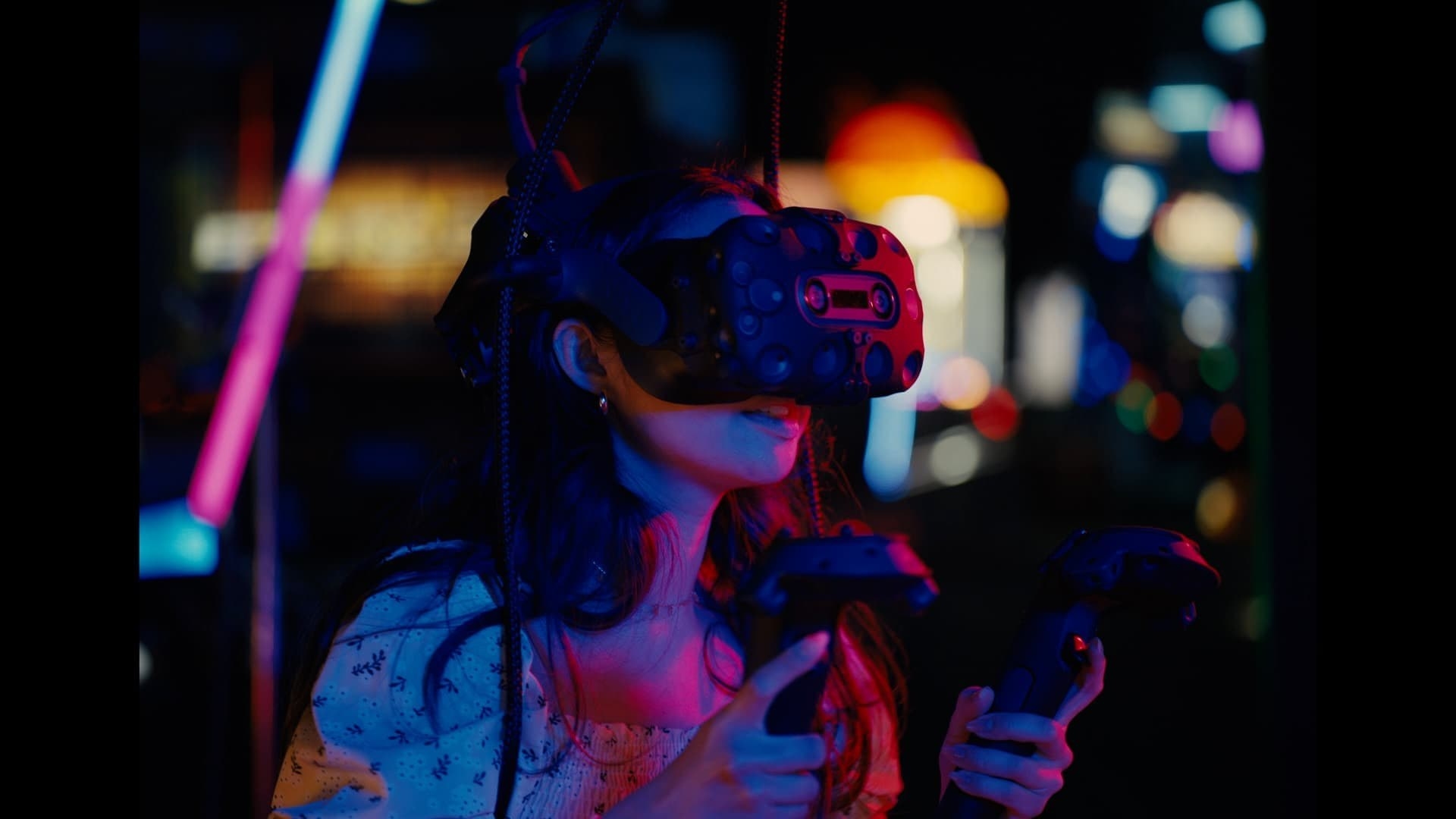 A woman plays a virtual reality game.