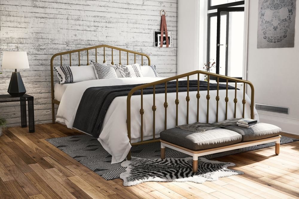 The bed frame in the color Gold Metal