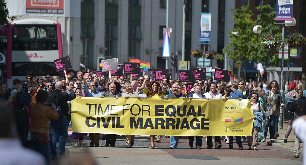 Thousands of people take part in a march and rally calling for legislation for same-sex marriage on June 13, 2015 in Belfast, Northern Ireland
