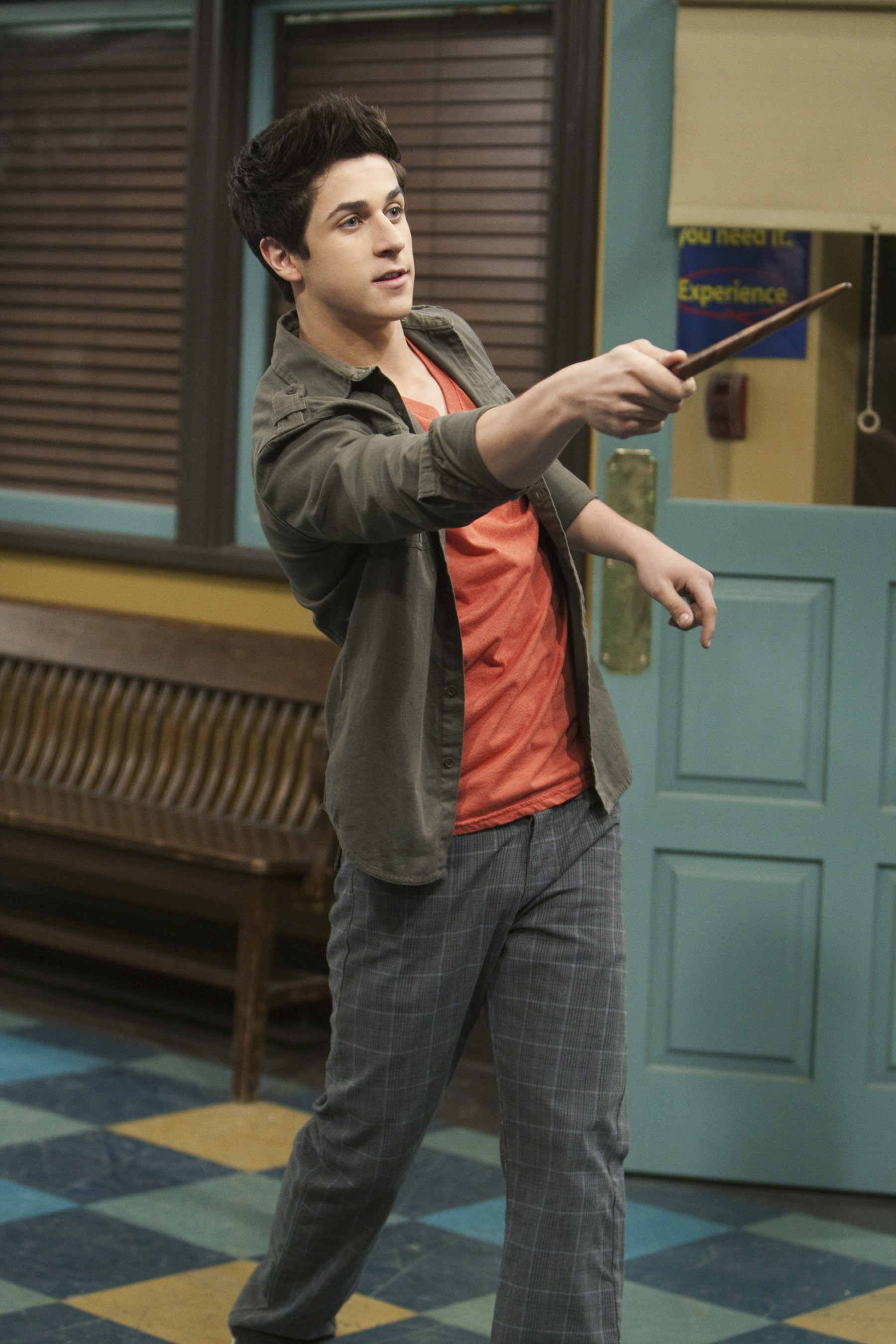 David Henrie holding a wand in &quot;Wizards of Waverly Place&quot;