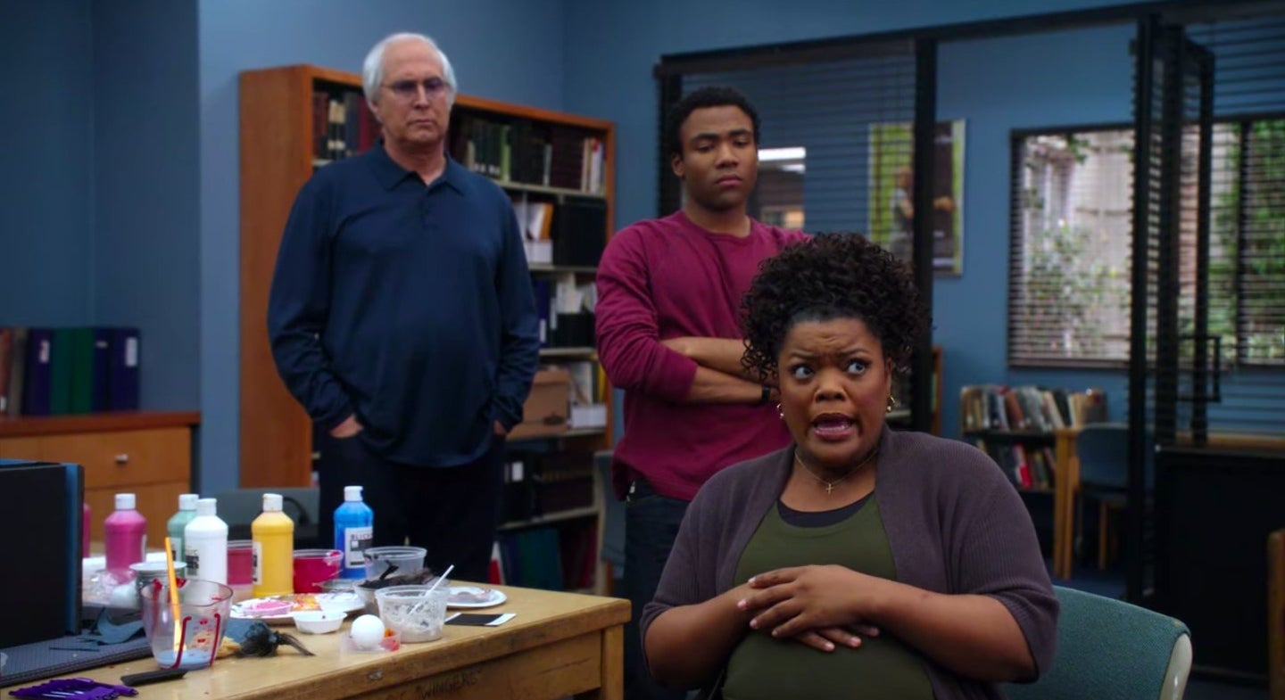Shirley talking with Troy and Pierce standing behind her in &quot;Community&quot;