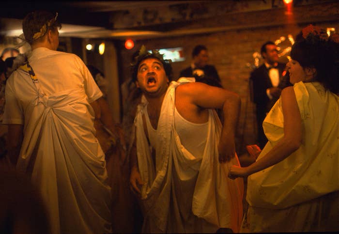men in togas at a frat party