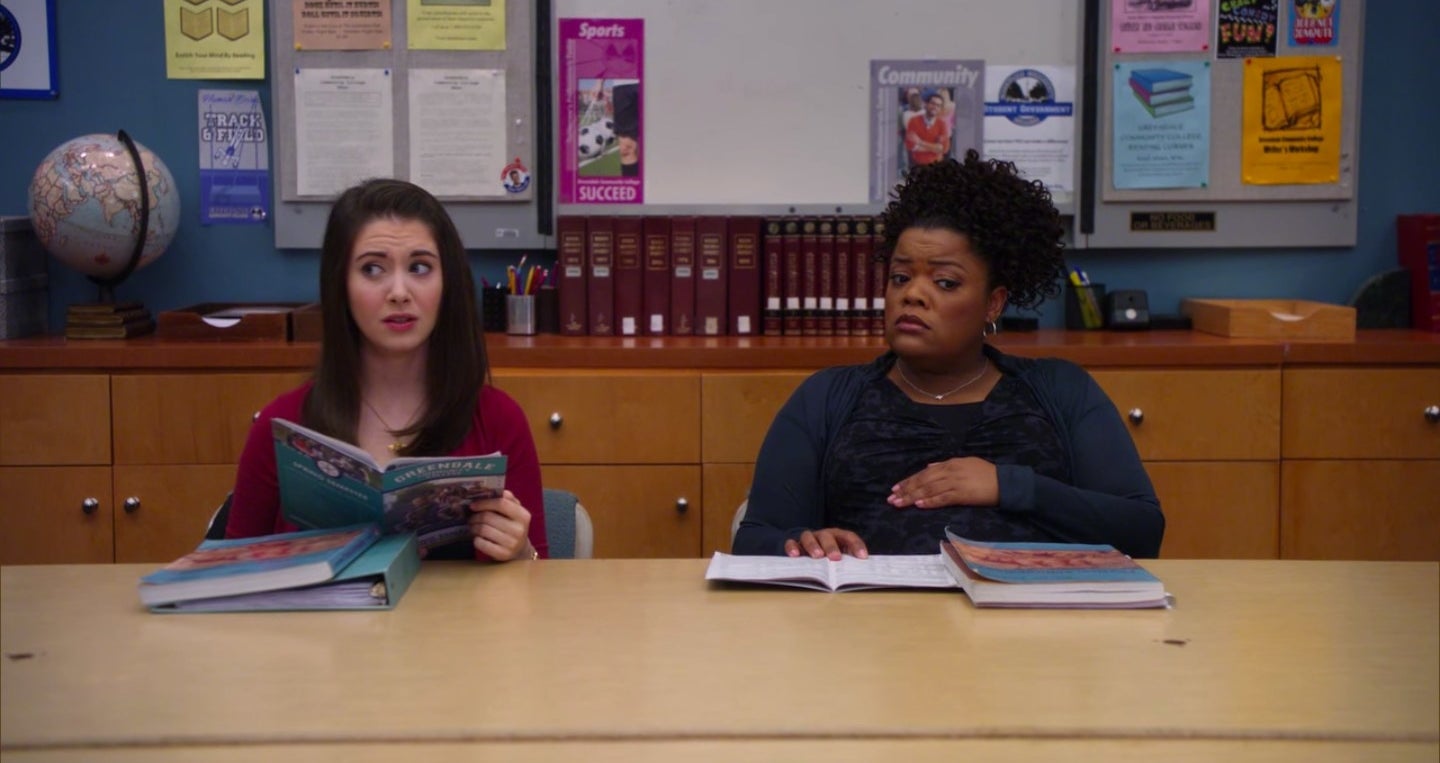 Annie and Shirley sitting next to each other in the study room in &quot;Community&quot;