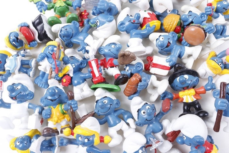 A bunch of Smurfs figures