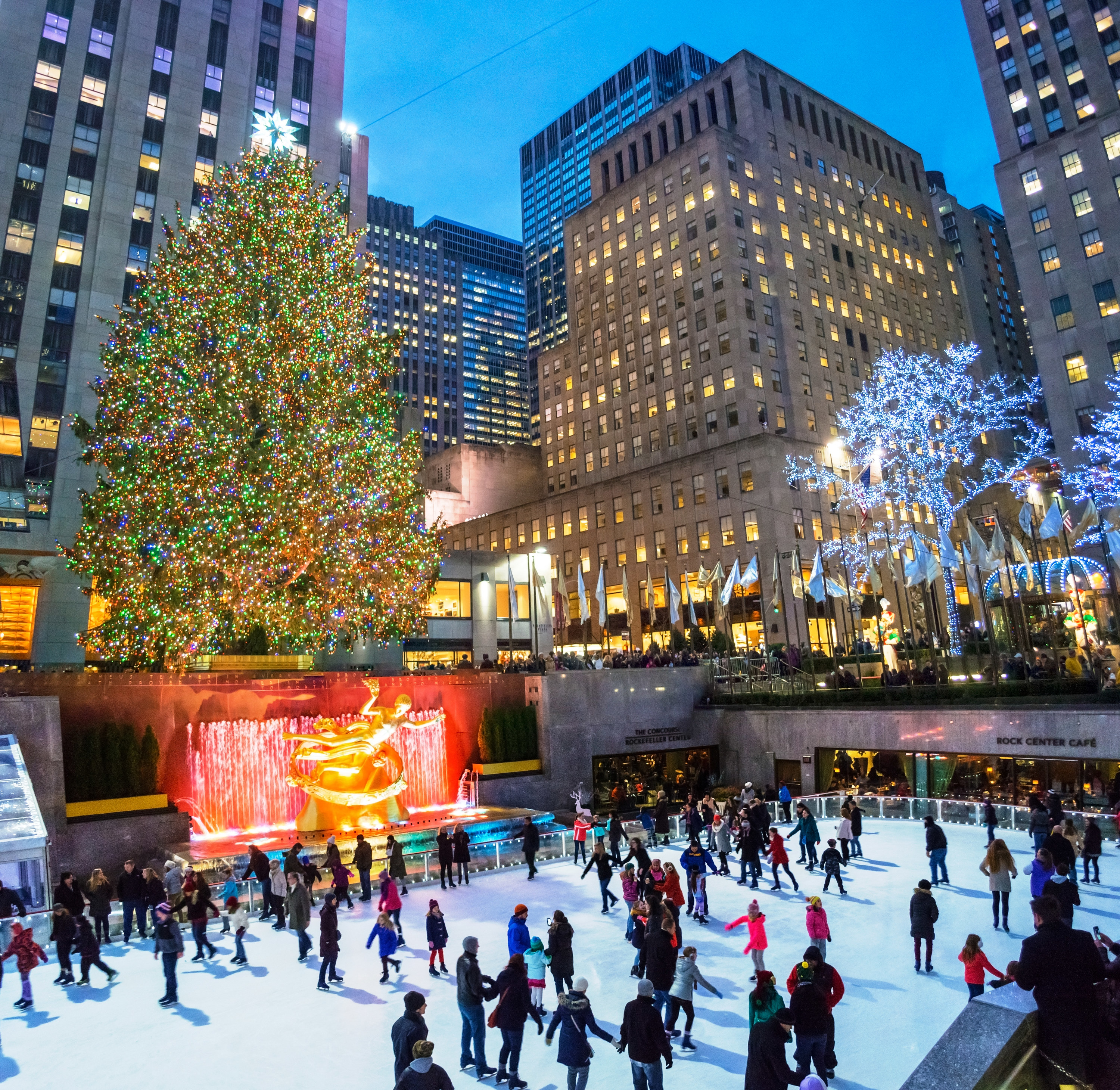 People ice skating under the Christmas tree at Rockefeller Center