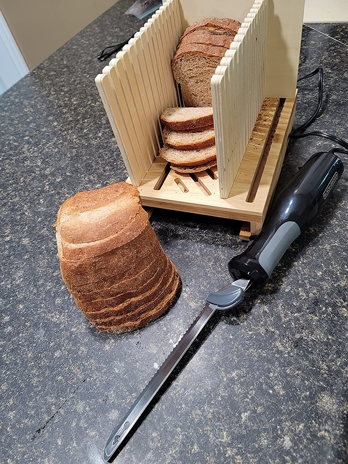 Reviewer photo of sliced bread next to the electric knife