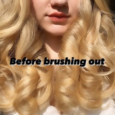 Maitland Quitmeyer showing her hair with text: "Before brushing out"