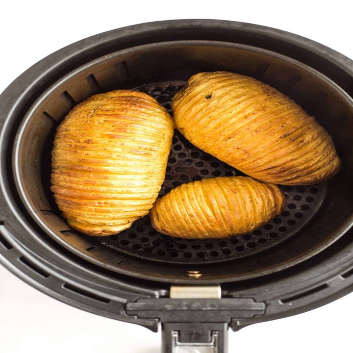 Three potatoes in the air fryer.