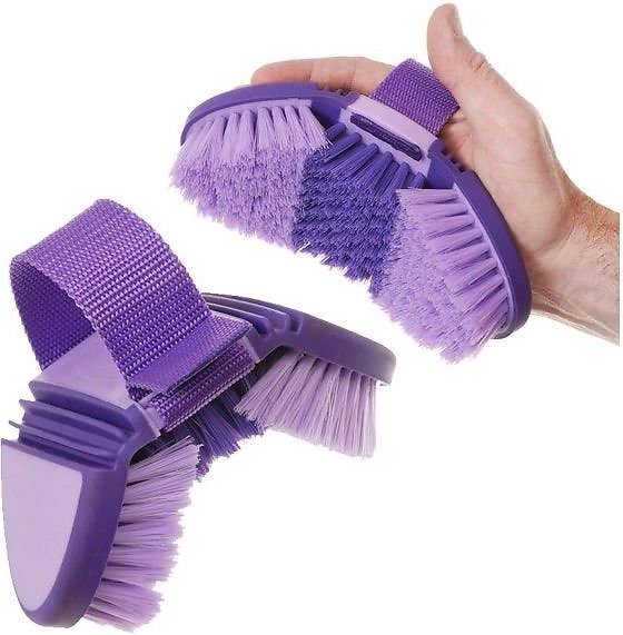 A hand-held horse brush with two flexible joints