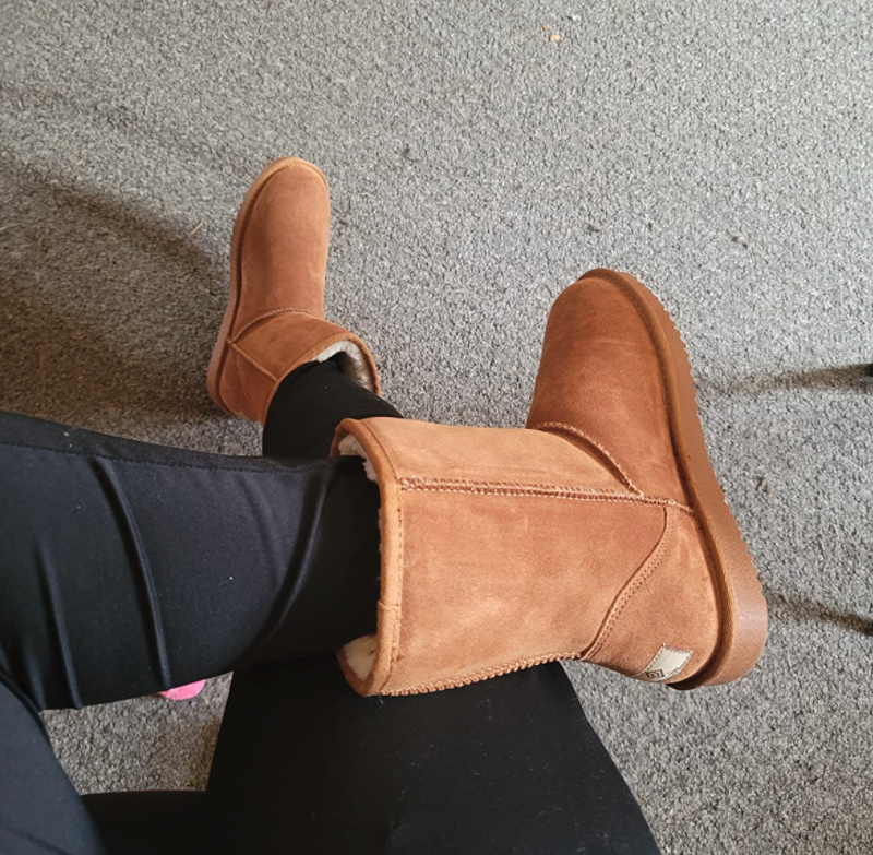 reviewer wearing camel-colored pair with leggings