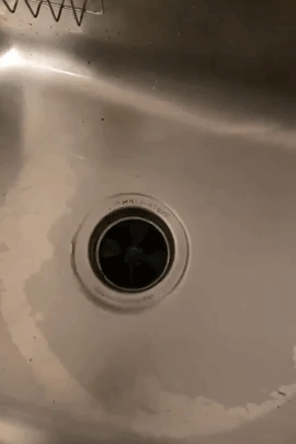 Reviewer gif of garbage disposal cleaner foaming up