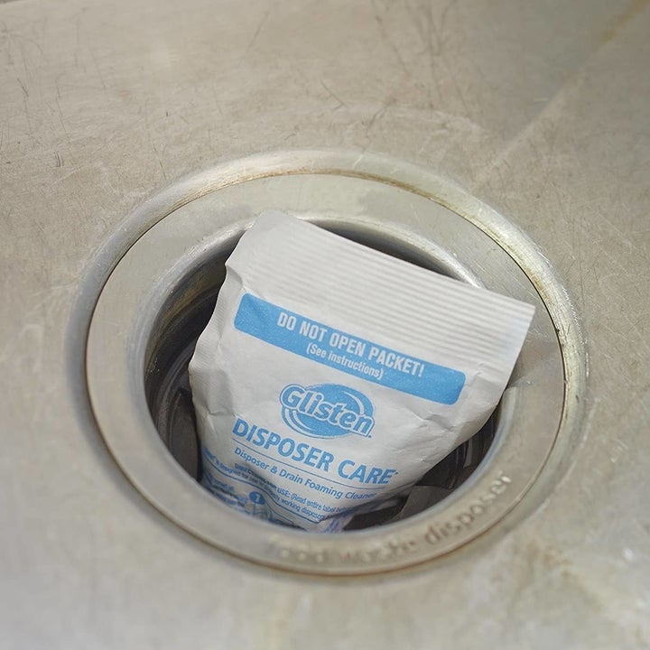 Garbage disposal cleaner packet in disposal