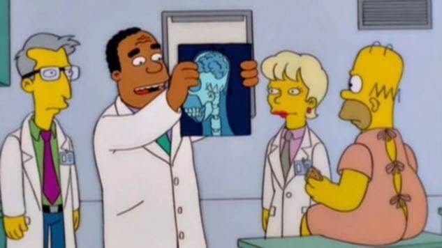 Doctor holding up Homer Simpson&#x27;s x-rays