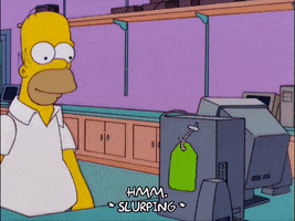 Homer seeing a $5000 price tag on a computer, taking a sip of coffee, then looking at the price tag again and spitting his coffee out