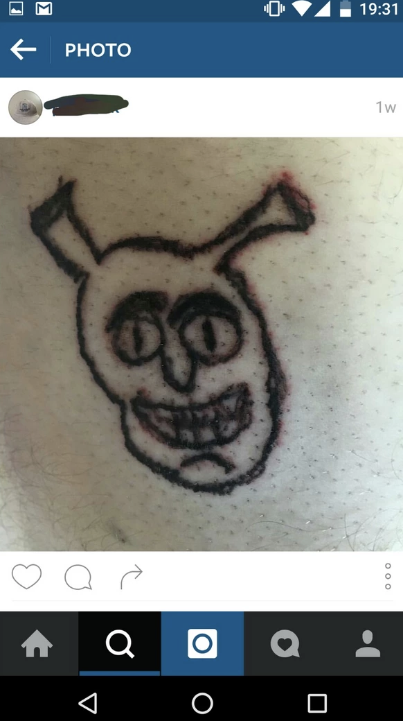 Bad tattoo of homemade Shrek tattoo