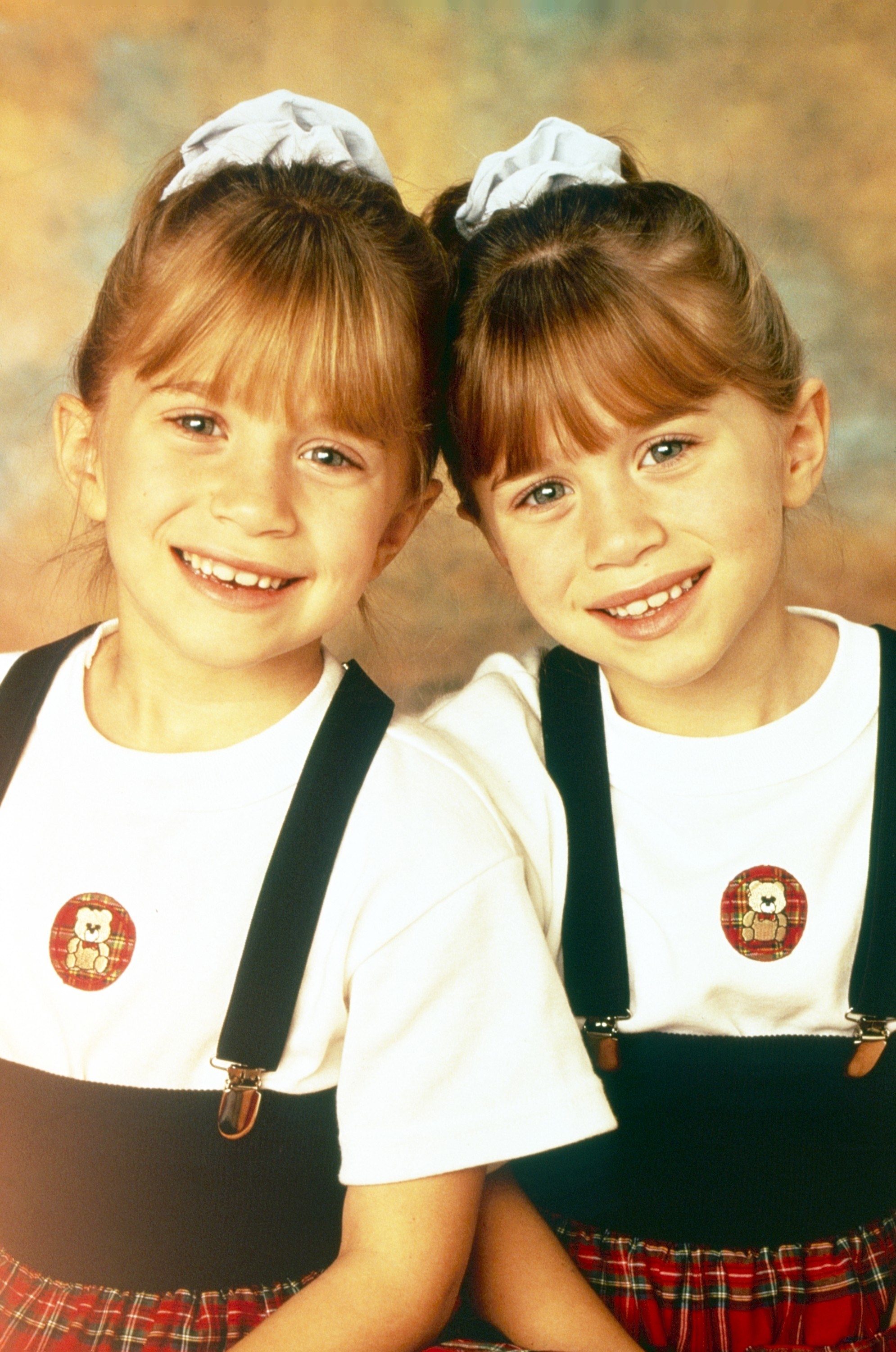 Mary-Kate and Ashley in matching costumes as Michelle