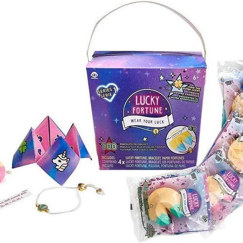 a purple takeout container, a bracelet, a fortune cookie and four individually packaged fortune cookie toys